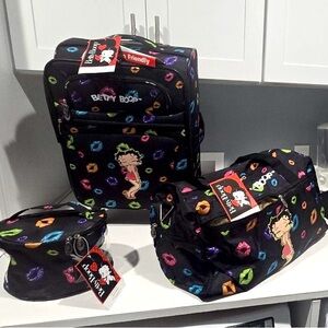 NEW BETTY BOOP duffle bag, make up bag and Luggage bag. Plus free Betty Boop bag